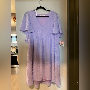 Purple- sparkle dress. Knee length. Short sleeve.